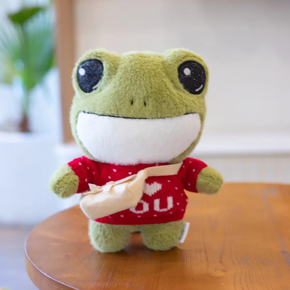 Swoakie: Adorable Frog Plush in Cozy Sweater Designs