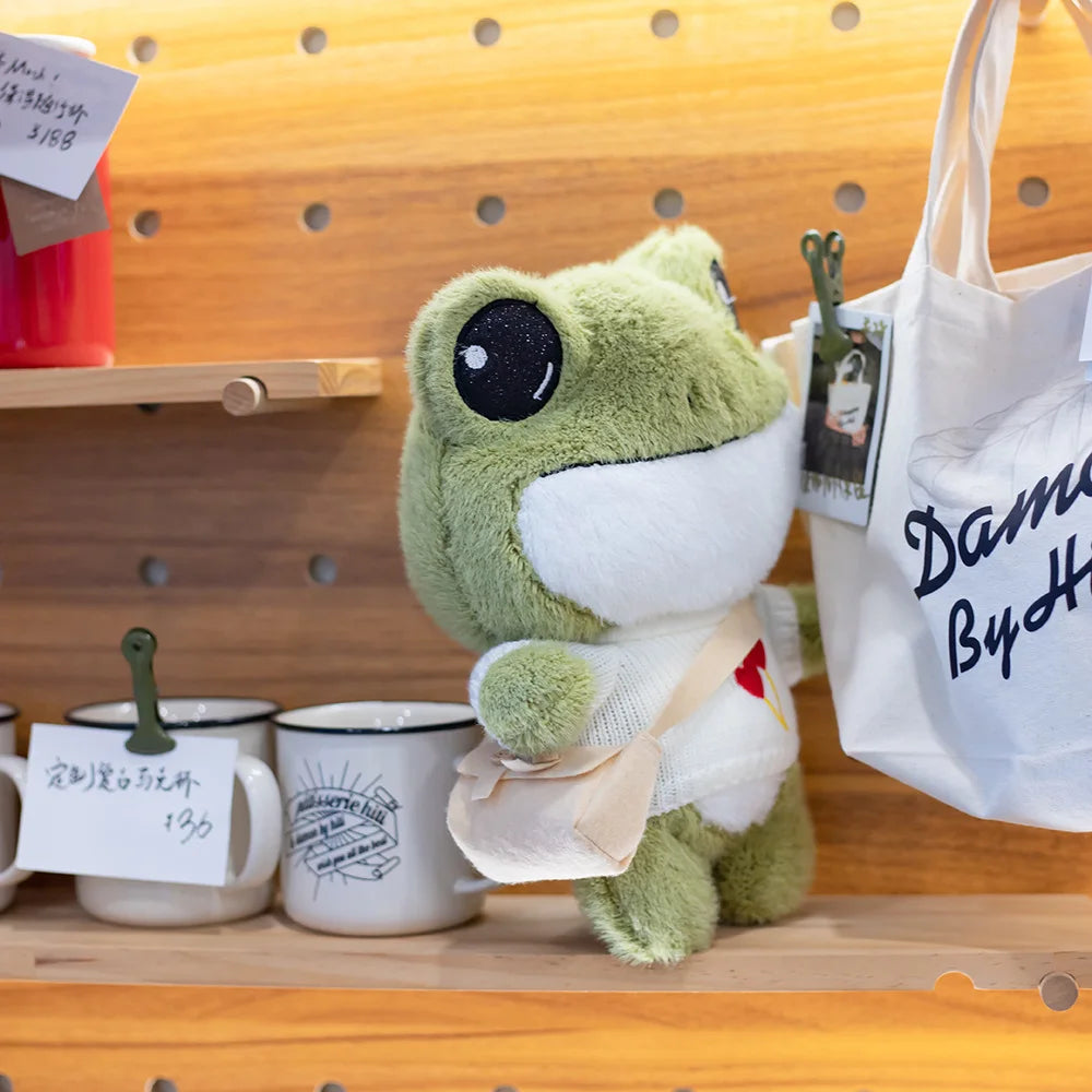 Swoakie: Adorable Frog Plush in Cozy Sweater Designs