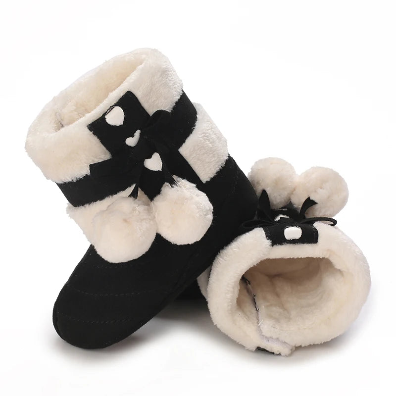 Muhz: Sleek, All-Black Baby Winter Boots with Straps