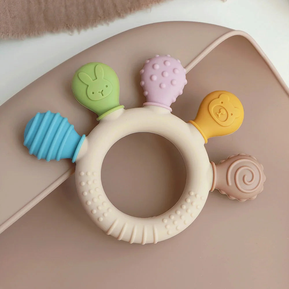 Chewwy: Textured Silicone Teething Ring with Rattle for Soothing Relief and Playtime Fun