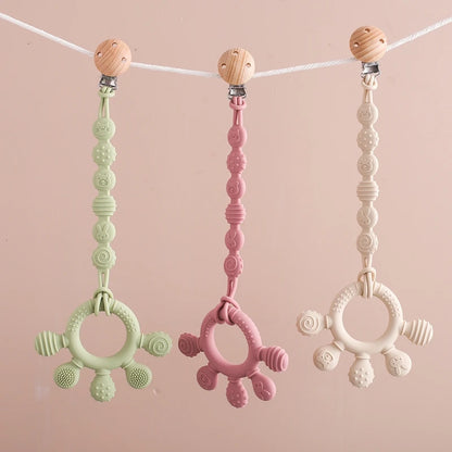 Chewwy Clip: Silicone Teething Ring with Clip for Soothing and Convenience