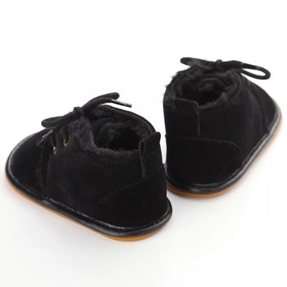 Muhz: Sleek, All-Black Baby Winter Boots with Straps