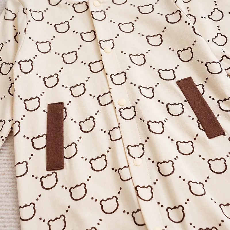 Monosy: Elegant Baby Romper with Chic Monogram Design