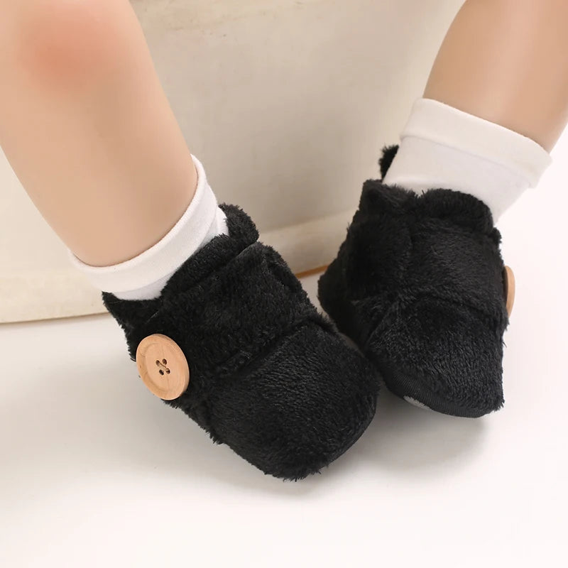 Muhz: Sleek, All-Black Baby Winter Boots with Straps