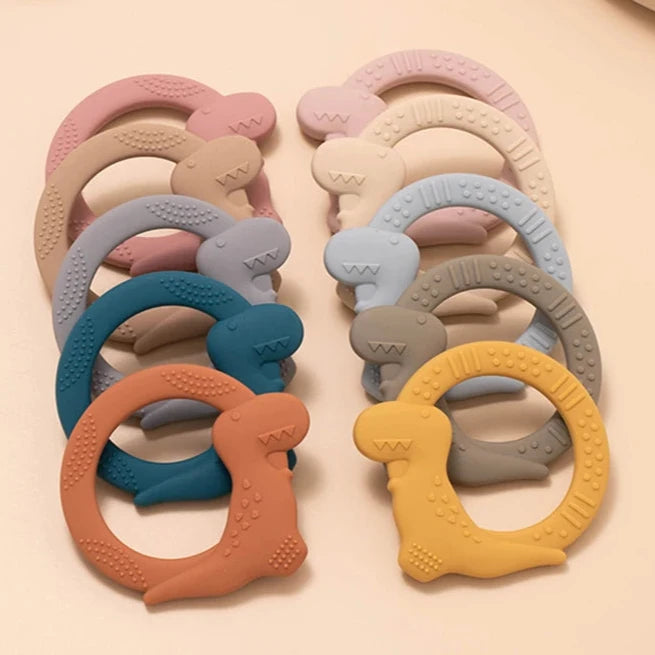 Dinnox: Dinosaur-Themed Silicone Teething Ring to Soothe and Entertain Babies