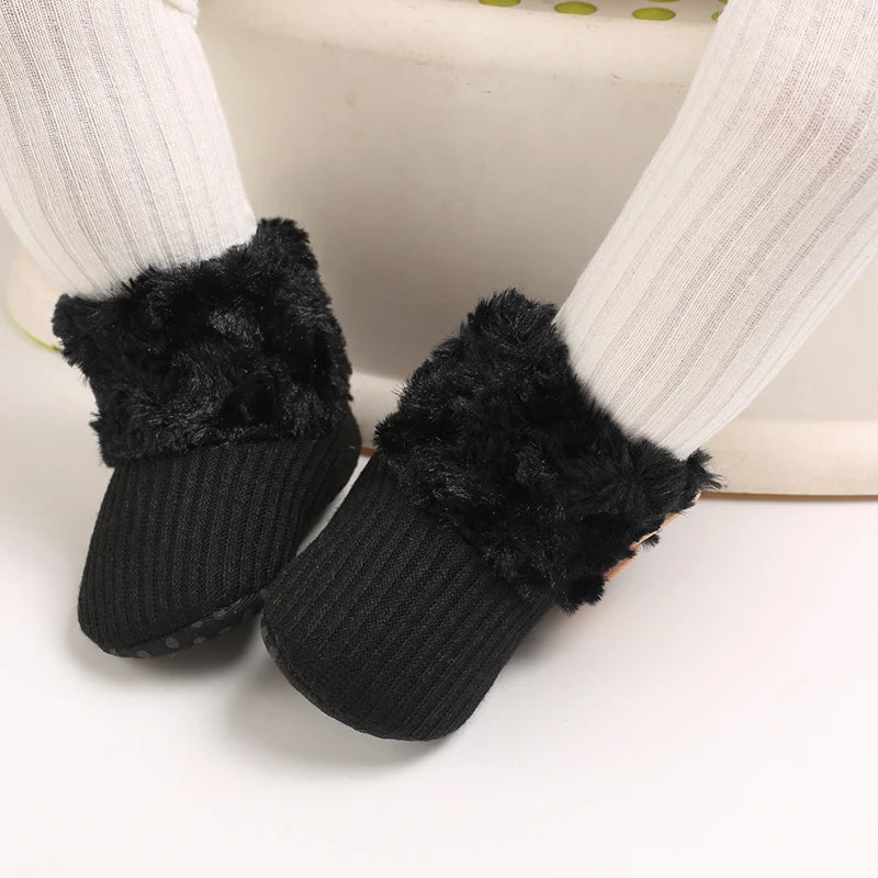 Muhz: Sleek, All-Black Baby Winter Boots with Straps