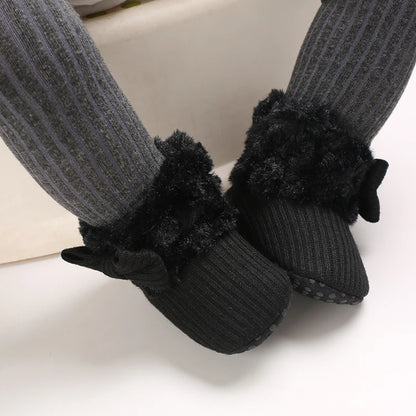 Muhz: Sleek, All-Black Baby Winter Boots with Straps