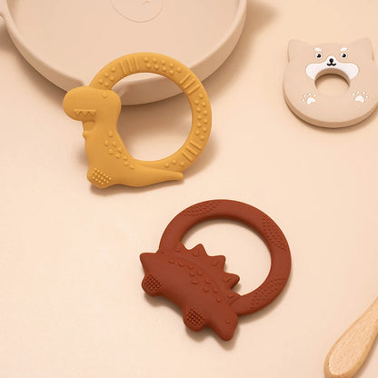 Dinnox: Dinosaur-Themed Silicone Teething Ring to Soothe and Entertain Babies