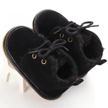 Muhz: Sleek, All-Black Baby Winter Boots with Straps